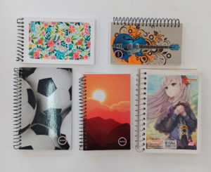 Cuadernos escolares espirales avon